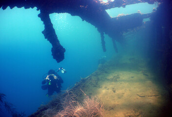 scuba diver underwater ship wreck caribbean island