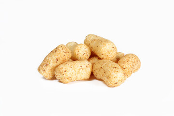 Peanut flips isolated on white background. Pile of snack food close-up