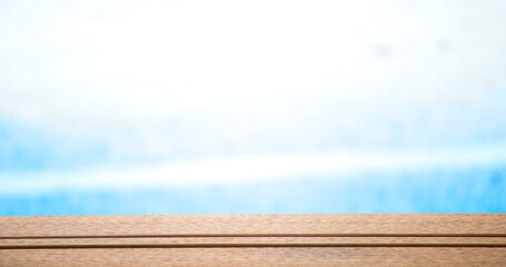 wooden table on blue background