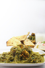 Cluster Beans Curry-Gwar ki Sabzi served with rice roti and Papad.selective focus.