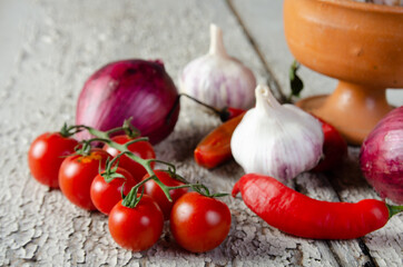 spices on an old rustic wood in a harmonious arrangement