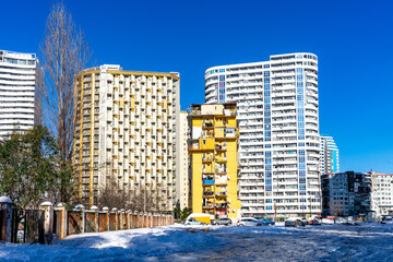 Batumi, Adjara, Georgia - 14.03.2020: soviet-style house residence in the winter with snow in...