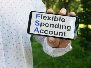 Flexible Spending Account FSA is shown on the conceptual business photo