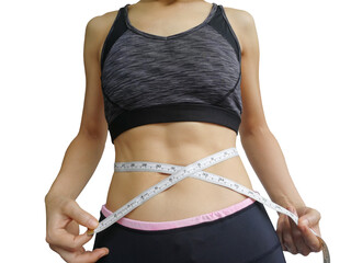 40-year-old housewife with exercise and health care. Girl in exercise clothes And waist tape measure Sports bra and exercise pants. The girl in the body fit and firm.