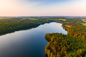 Fototapeta na wymiar Summer morning landscape on the lake aerial view