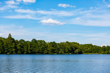 Obraz na płótnie Canvas July landscape on a quiet lake. Camping