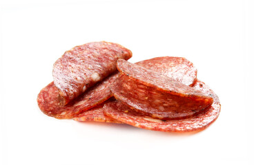 Salami sausage slices isolated on white background. Tasty smoked meat close-up