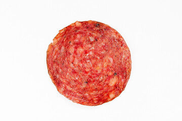 Salami sausage slice isolated on white background. Meat above