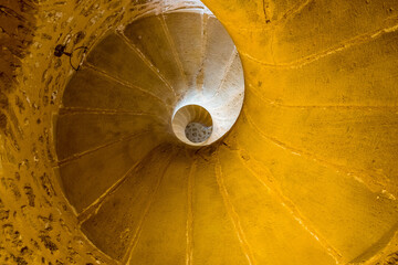 A spiral staircase  in the castle of Castellammare del Golfo, Sicily in the summertime