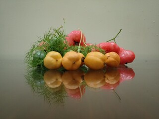green red and pink fruits