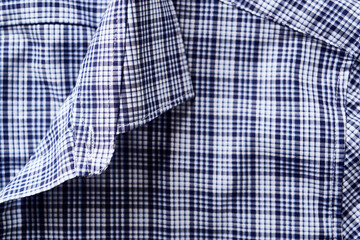  Close up of Men's checkered shirt.