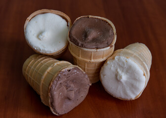 Chocolate and cream ice cream in a glass. Cold dessert Brown and white ice cream 