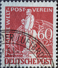 GERMANY, Berlin - CIRCA 1949: a postage stamp from Germany, Berlin in rust brown color showing the Postmaster Heinrich von Stephan Text: 75 years of world post association