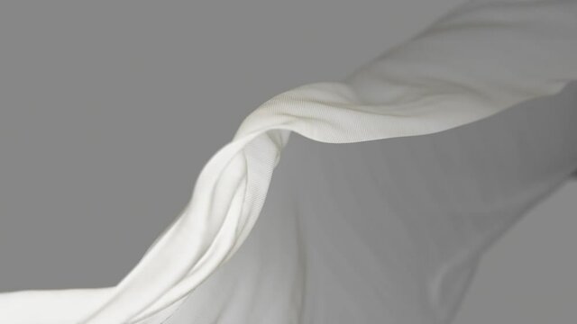 4k White wave satin fabric loop background.Wavy silk cloth fluttering in the wind.tenderness and airiness.3D digital animation of seamless flag waving ribbon streamer riband.