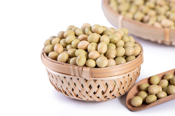 Yellow-green Taiwanese organic non-GMO soybeans, soy beans in a container isolated on white backgorund, close up, clipping path.