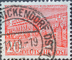 GERMANY, Berlin - CIRCA 1949: a postage stamp from Germany, Berlin showing Berlin buildings: Technical University Berlin Charlottenburg in red