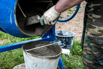 The preparation of the concrete mortar in concrete mixer.