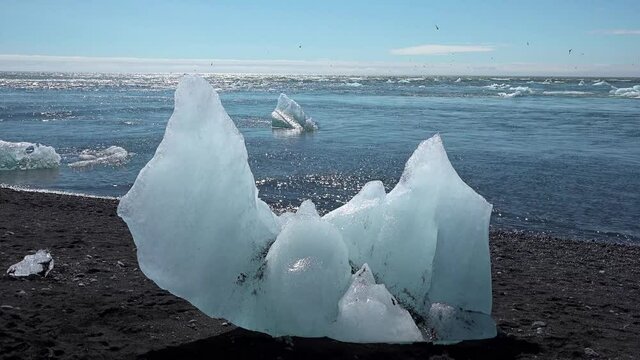 Svalbard.Norway.Ice Floes on background of mountain on water of Arctic Ocean in Svalbard. Wildlife in Nordic badlands. Unique footage on background natural landscape and snow of Spitsbergen.
