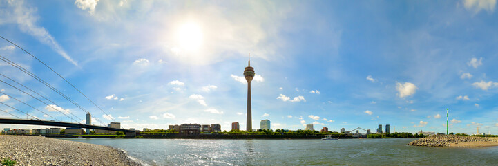 Panorama of the Dusseldorf skyline with the famous television tower and the Rhine on a beautiful summer day