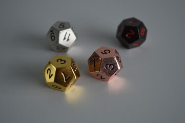 multiple d12 twelve sided dice die copper silver gold black