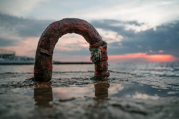 Fototapeta premium rusty iron bracket on a mooring