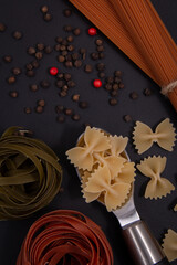 Shaped and colorful pasta in different shapes, sizes and colors from close range.