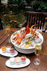 Seafood on ice with white wine