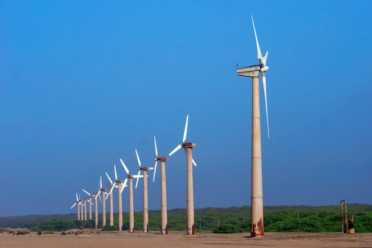Windmills for electric power production at mandvi beach, gujarat, india.
