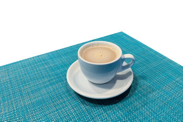 cup of coffee with milk on a saucer isolated on white background