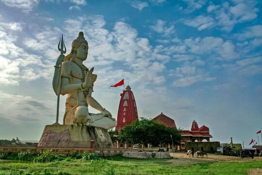 Giant sculpture of Shiva Nageshwar at the famous Nageshwar temple close to Dwarka. Gujarat. India.