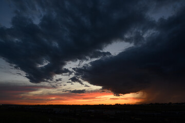 Fototapeta na wymiar dramatic dark sky at sunset