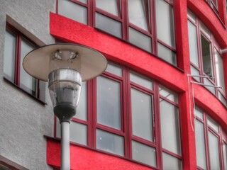 street lamp on red wall