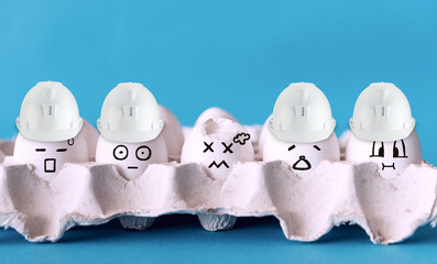 Faces on the eggs, construction protective equipment helmet concept