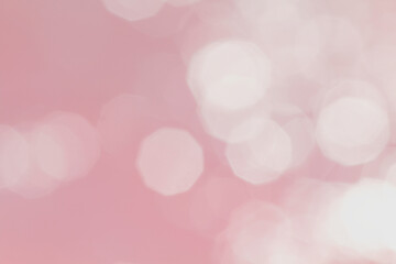Bright blurred image of sun glare, pink pastel colors. Large light spots. Festive background or...