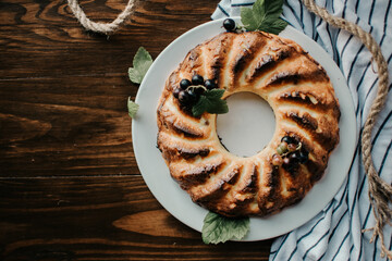 Cottage cheesecake with berries. Homemade food. Cheesecake with cranberries. Baking cheesecake with cottage cheese and berries. Sweet cake with berries and cottage cheese.