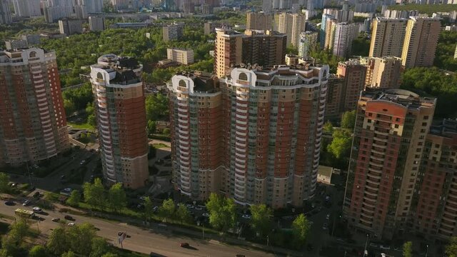 sunset light moscow city living block aerial flight over panorama 4k russia