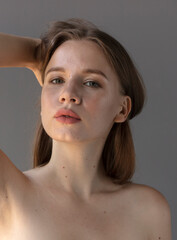 studio portrait of a young woman