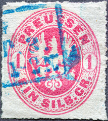 GERMANY - CIRCA 1861 a postage stamp.shows from  in red the Coat of Arms of Prussia Prussian Eagle in oval with value 1 silver groschen