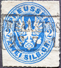 GERMANY - CIRCA 1861 a postage stamp.shows from  in blue the Coat of Arms of Prussia Prussian Eagle in oval with value 2 silver groschen