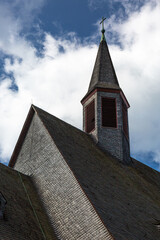 Exterior of old church and cloudy sky