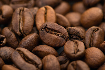 Coffee beans close-up background. Fresh roasted