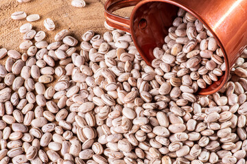 Raw brown bean grains seen close up