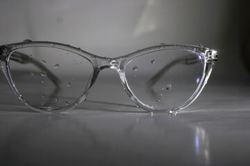 glasses on black background