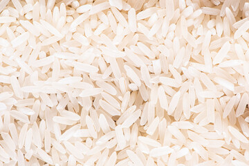 Grains of rice seen from above.Background of  basmati rice (Top view).