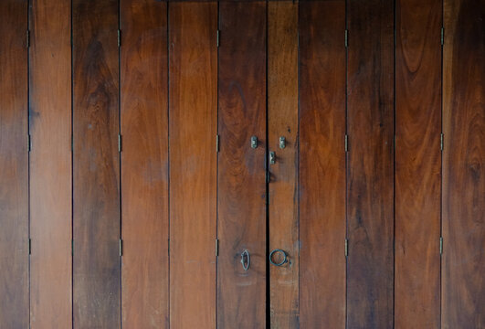 Wood plank door texture background.