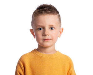 Portrait of a beautiful European boy 6 years old on a white background. Serious smart kid. A calm, expressive look.