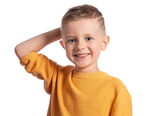 Portrait of a beautiful European boy 6 years old on a white background. The blue-eyed child is smiling broadly, his hand behind his head. Children's emotions. 