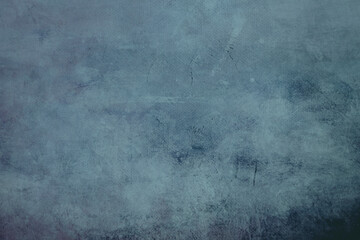 Fototapeta na wymiar bluegrungy canvas background or texture with dark vignette borders