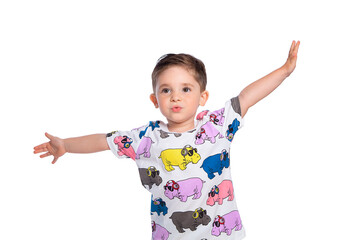 Portrait of a beautiful European boy 2 years old, depicts a full-length plane. isolated on a white background. A beautiful and happy child. A child's smile.