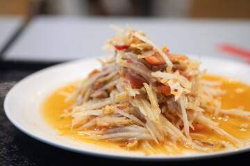 Papaya salad with grilled pork neck
